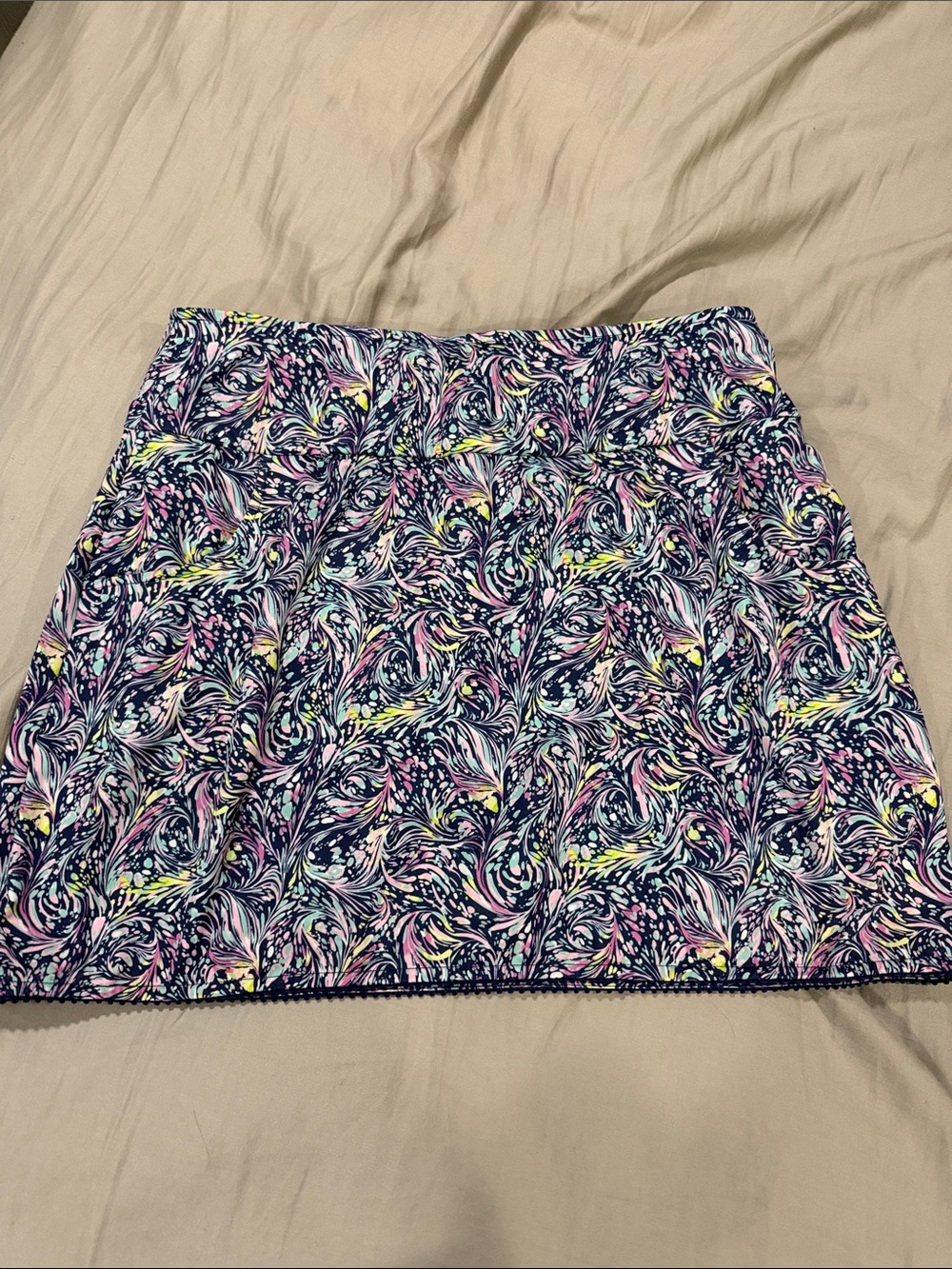 Navy Swirl-Print Golf Skirt with Pastel Accents and Pockets